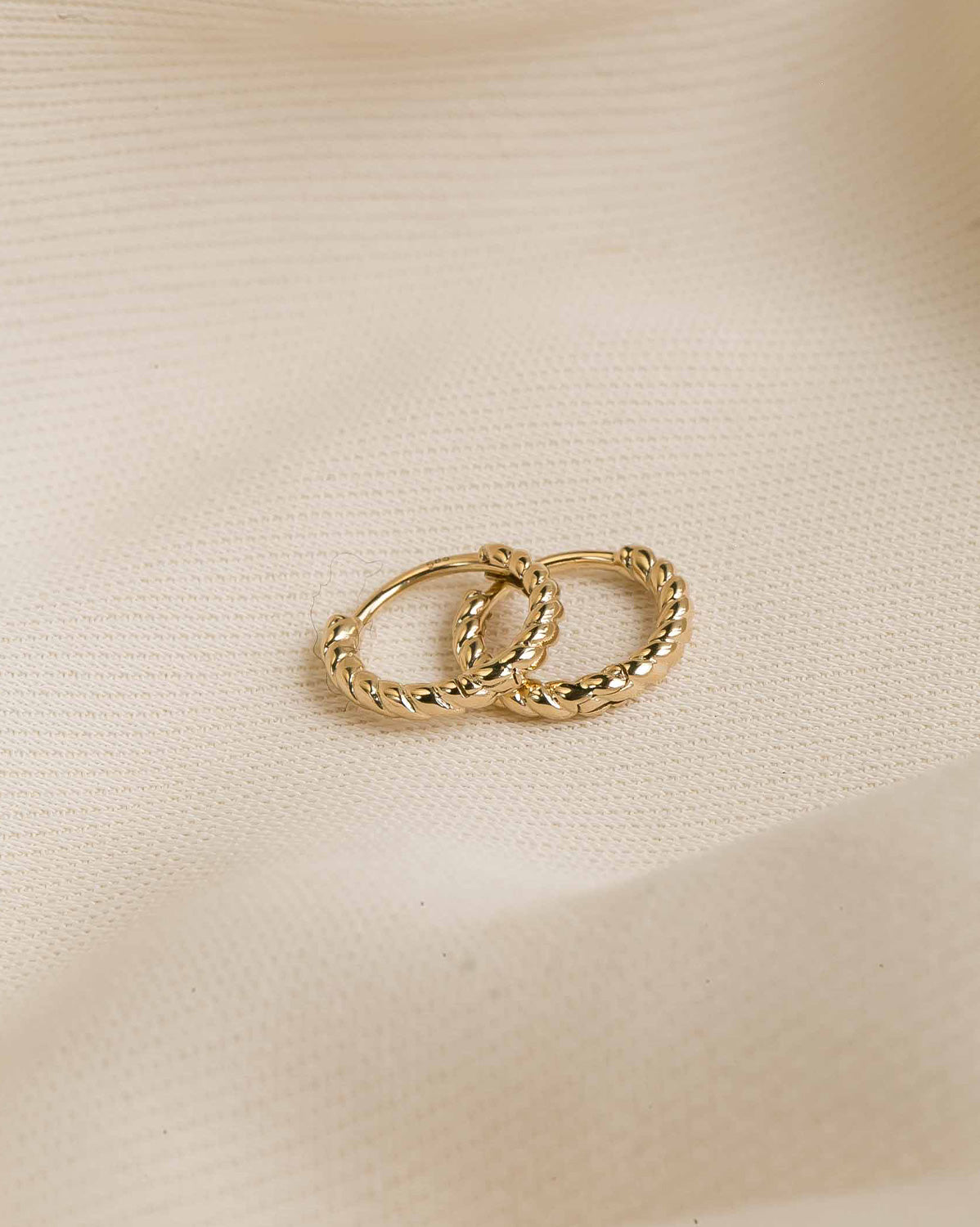 14K Solid Gold Bella Twist Huggie Hoops | S-kin Studio Jewelry | Ethical Piercing Earrings