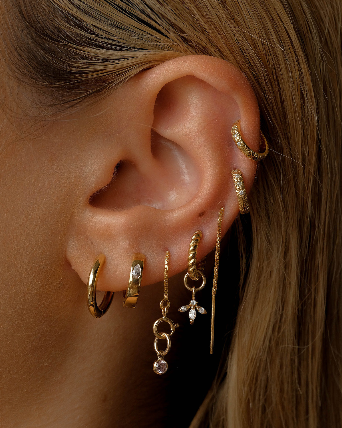 14K Solid Gold Bella Twist Huggie Hoops | S-kin Studio Jewelry | Ethical Piercing Earrings